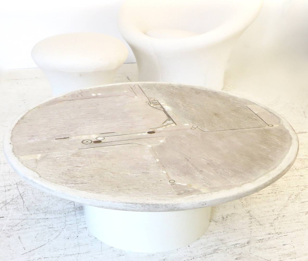 A stunning round ivory white stone, mosaic copper, brass and collected river stones coffee table by Paul Kingma. Signed and dated1986. 
The white versions are very rare. 
KIngma, a dutch artist created coffee tables inspired by the stones that he