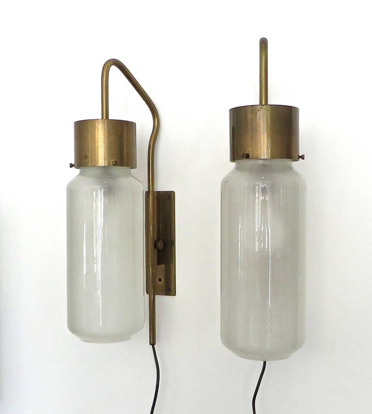 Luigi Caccia Dominioni vintage Italian pair of sconces for Azucena. Model no LP10. Designed in 1958. Bronzed tone brass and beautiful milk glass. Signed and numbered. Azucena is born of dialogue between the producer, architect, artisans and clients.