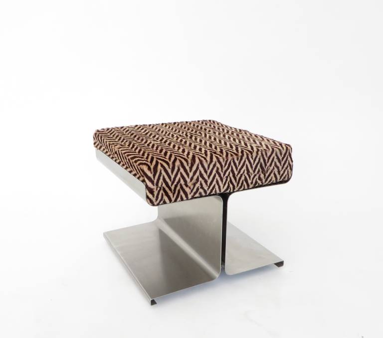 Stainless steel stool with a chevron silk velvet original cushion by French designer Francois Monnet who was an expert at using folded stainless steel.
The cushion is 16 x 16 x 2. 
Edited by Kappa.