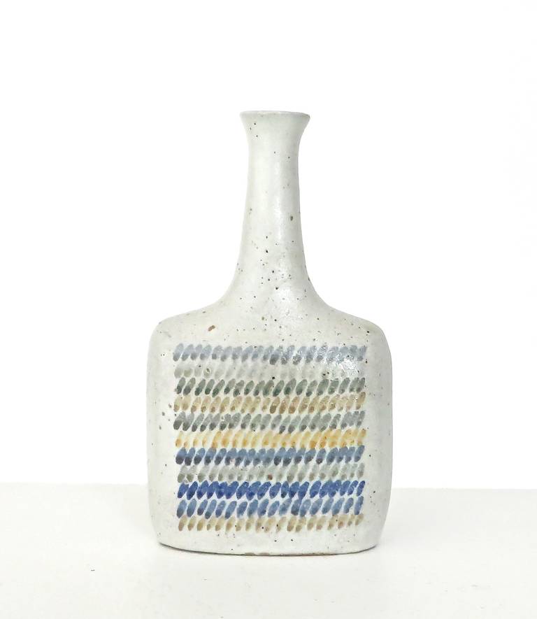 Cream and multicolor ceramic bottle vase by Bruno Gambone.
Same multicolor hash marked glaze pattern on both sides on creamy gray surface. Signed Gambone, Italy. 
No chips or restorations or cracks.