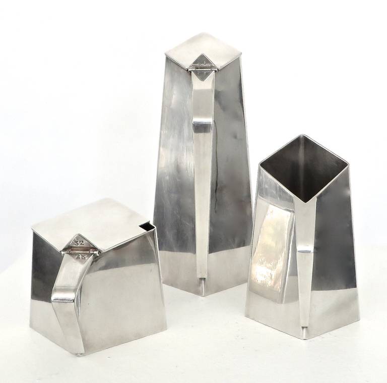 Modernist or Cubist  and architectural silver plate three piece tea set marked and stamped Spain. Interesting forms compose this set.