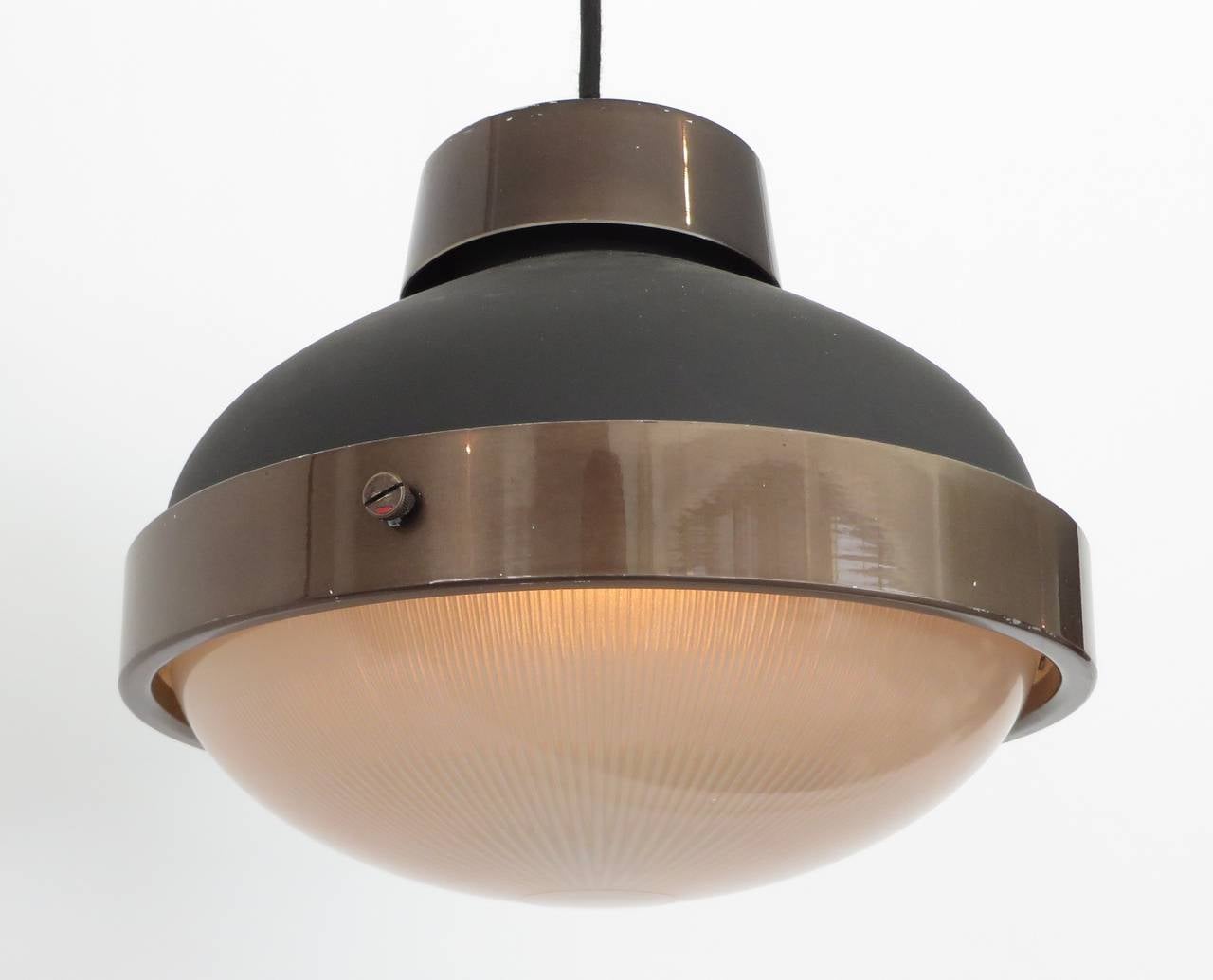 Gino Sarfatti Model 3027p, Italian ceiling lamp, circa 1960 that has been retrofitted to be a pendant but the original usage was as a ceiling fixture. This is in its beautiful original patina as found but It can be more highly polished. Pearl black