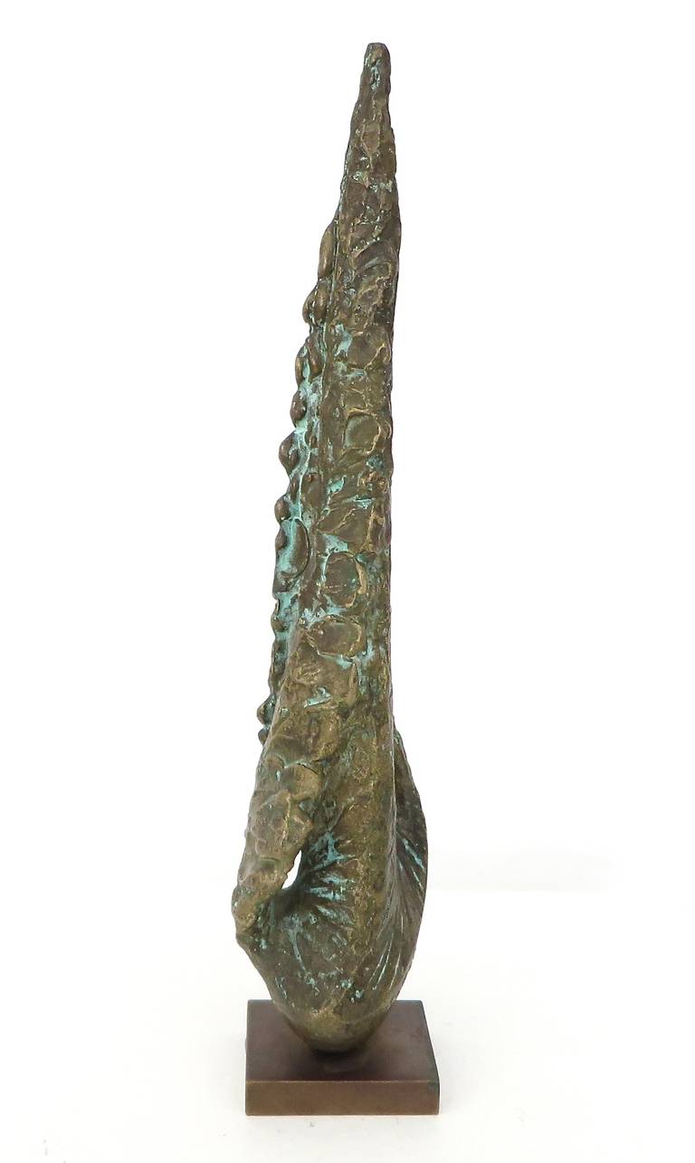 A bronze sculpture with gold and green patina by Alicia Moi. 1/6 circa 1990.
Alicia Moi often designed and produced sculptures for Claude de Muzac and Gallery Lacloche in Paris during the 1960s and 1970s. Signed and numbered and cast at the foundry