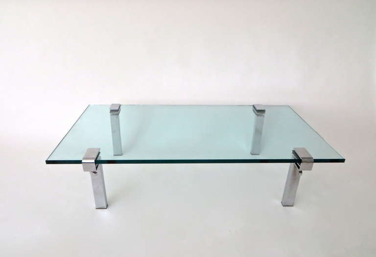 The T9 low coffee table designed by Francois Arnal. He designed the chrome plated steel legs of this table to accommodate varying thicknesses of plateaus.
With the T9 table bases, you can create a table of your own size by selecting your own top