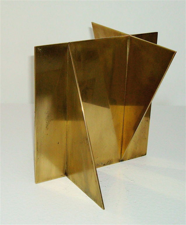 Three bisecting geometric planes of brass. Signed Wuytack. Belgian.