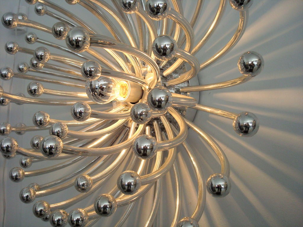 Chromed plastic Pistillo light by Studio Tetrach. The Pistillo was introduced by Studio Tetrach in the late 60's.  Pistillo is defined as the female reproductive organ of a flower or Pistil. <br />
The Pistillo can be used as a wall or table lamp