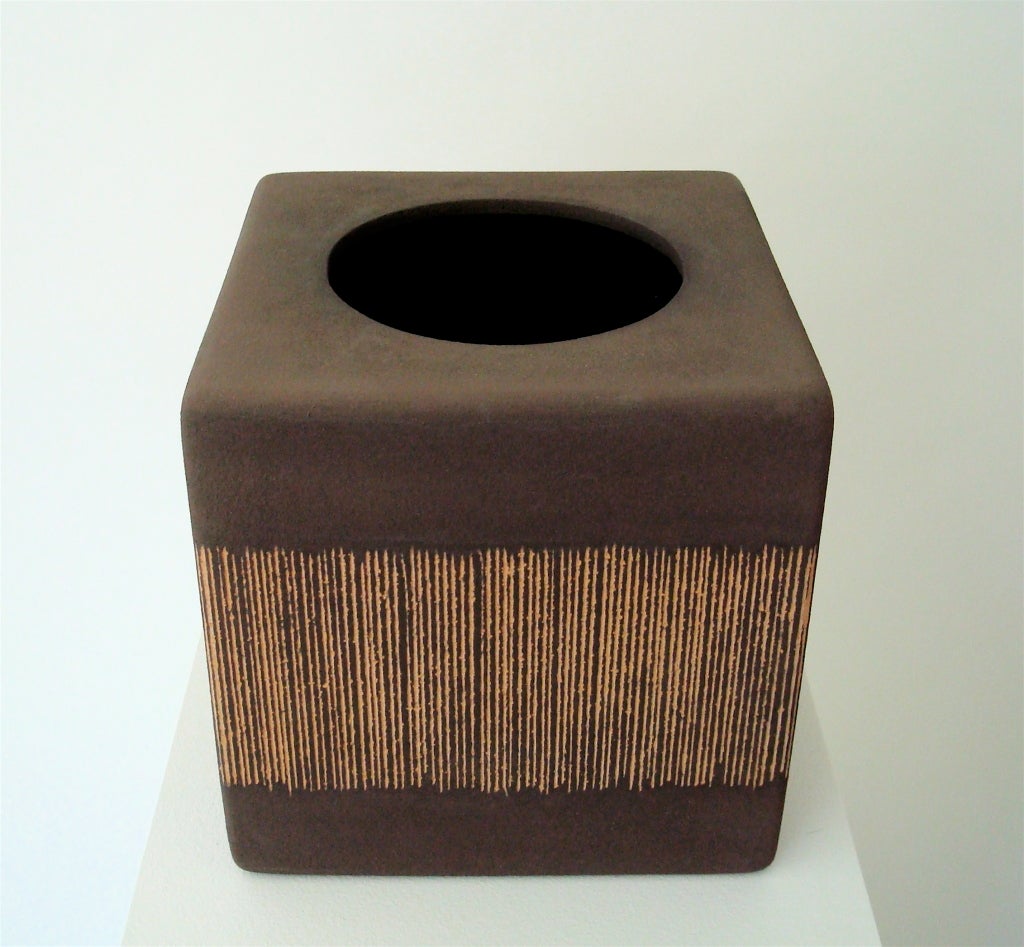 Large stoneware vase or vessel JG2 by Johanna Grawunder, 2002 Masks series.  
Signed Masks, 2002 4 of 6. 
A soft edge cube with an incised design motif, with a matte exterior and a high shine black glaze interior.