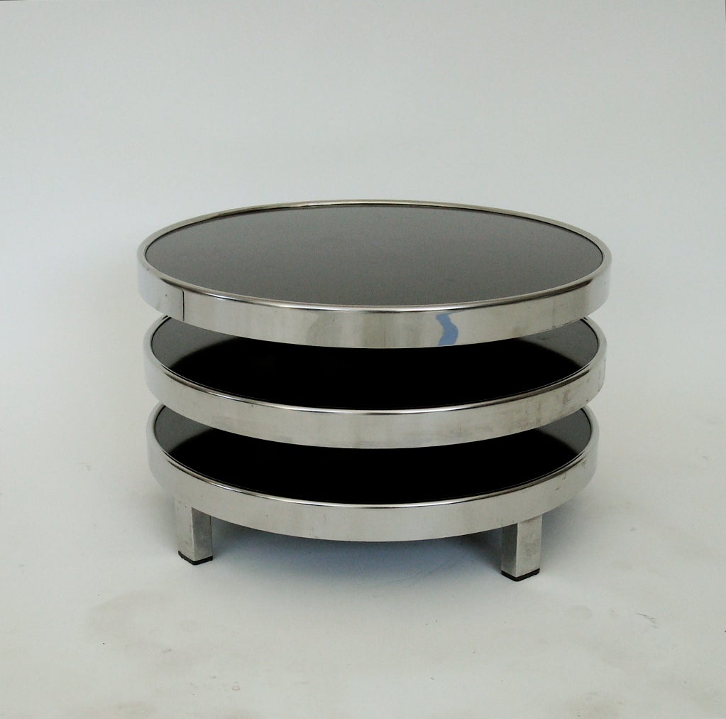 French side or coffee table with two black laquered laminate moveable plateaus for a series of different configurations by Mercier Freres. In the manner of Maria Pergay. Excellent condition.