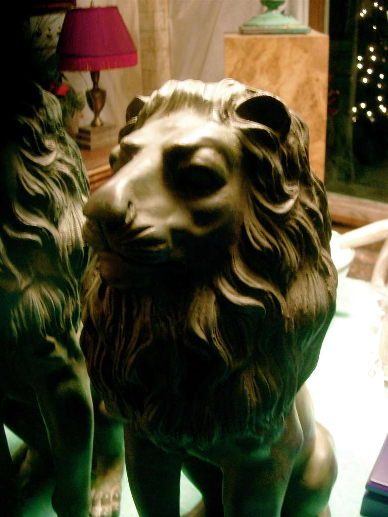 French Pair of Metal Lions with Verde Patina