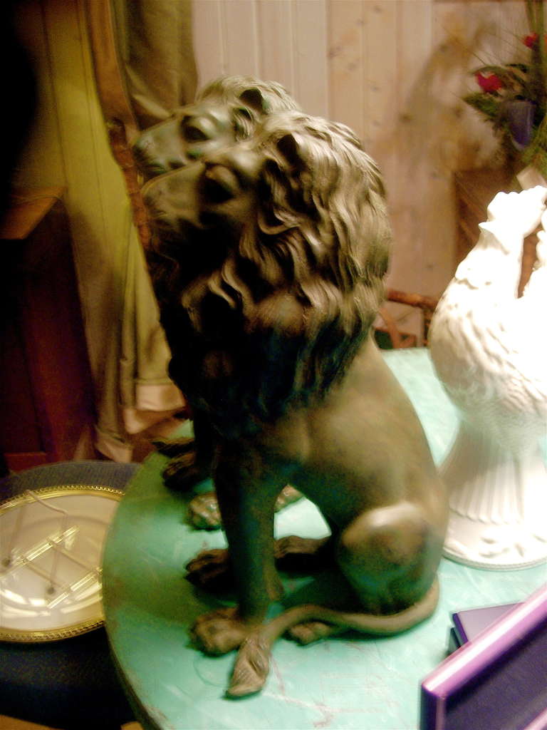 Pair of Metal Lions with Verde Patina In Excellent Condition In Buchanan, MI