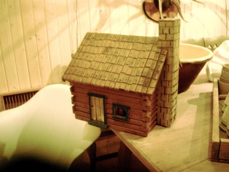 Charming Folk Art model of log cabin, very nice details.