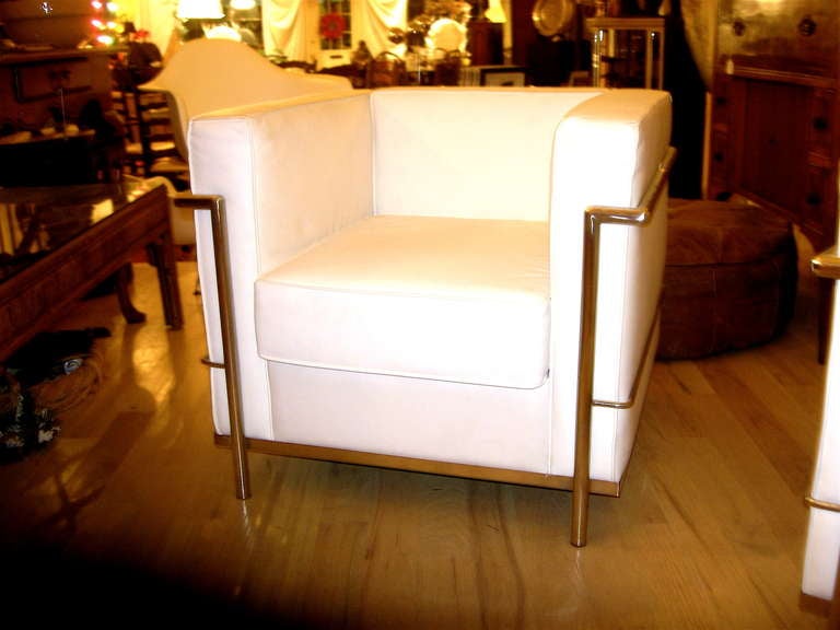 One Pair Of White Leather Club Chairs In The Style Of Le_Corbusier‎, also have matching three seat sofa. Sofa is 71