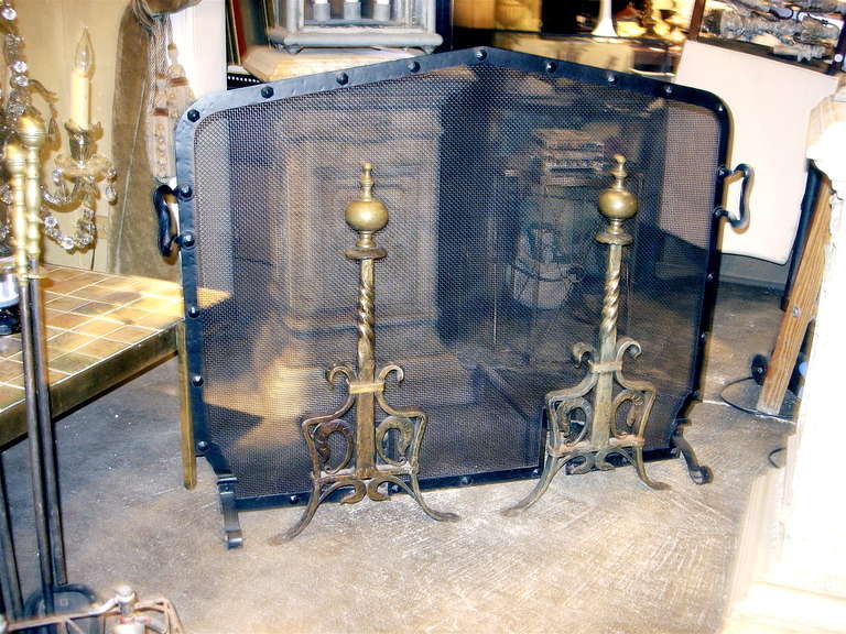 Exceptional English hand-forged iron fire screen with pair of bronze andirons. Great scale and very nice old patination.
