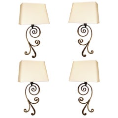 Set Of Four Iron Fragments Converted Into Sconces With Linen Shades