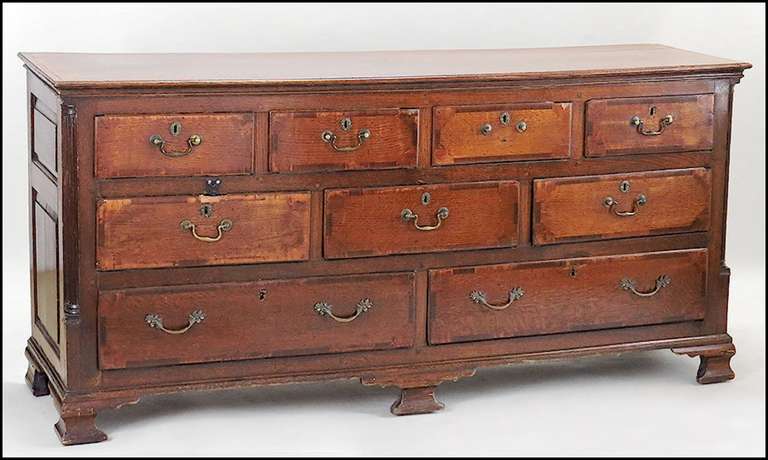 Unrestored 18th century English oak server with nine drawers with banding,  great form and color.  We are offering it as is for the time being but will be working on restoring the piece.  This was from the tower club which was the private club at