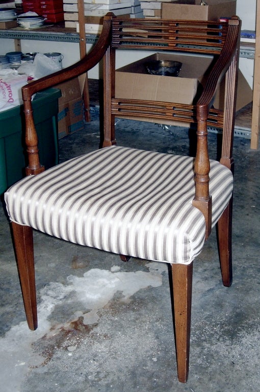 Set of six regency-style mahogany dining chairs. Five side chairs and one armchair. 
