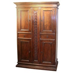 Early 19th Century Italian Walnut Four-Door Cabinet