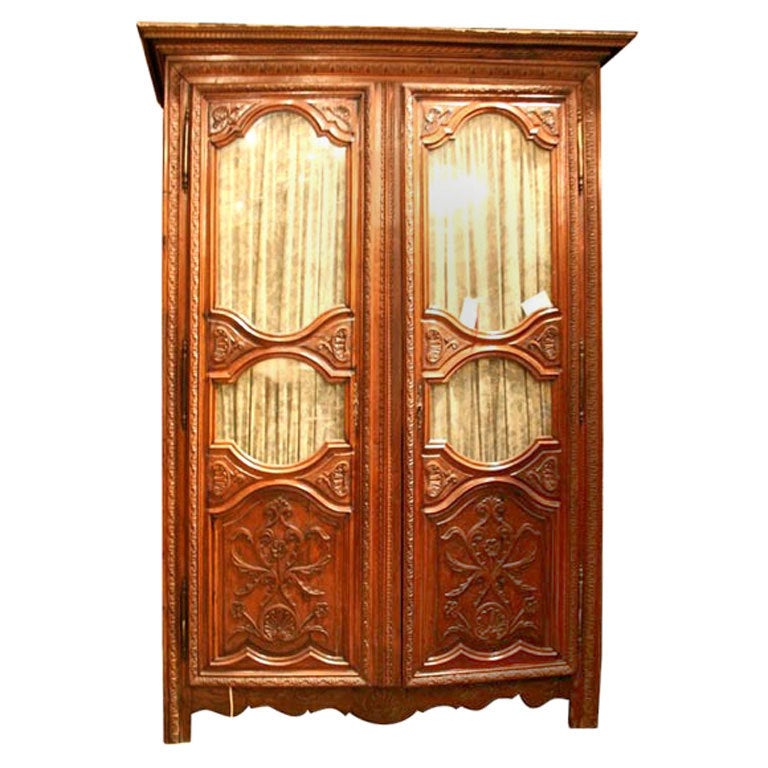 18th Century Louis XIV Carved Armoire For Sale