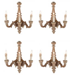 Set of Four French Carved Wood Three-Arm Sconces