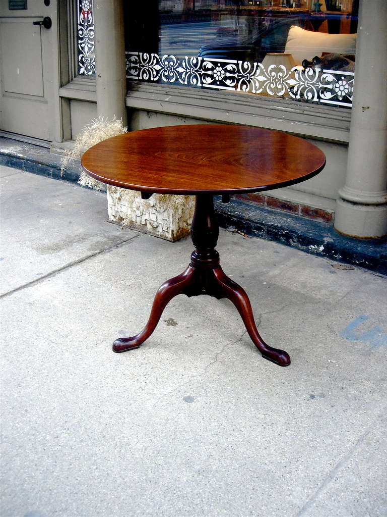 Handsome Geo III mahogany tilt-top table with single plank top, great color and pantination.