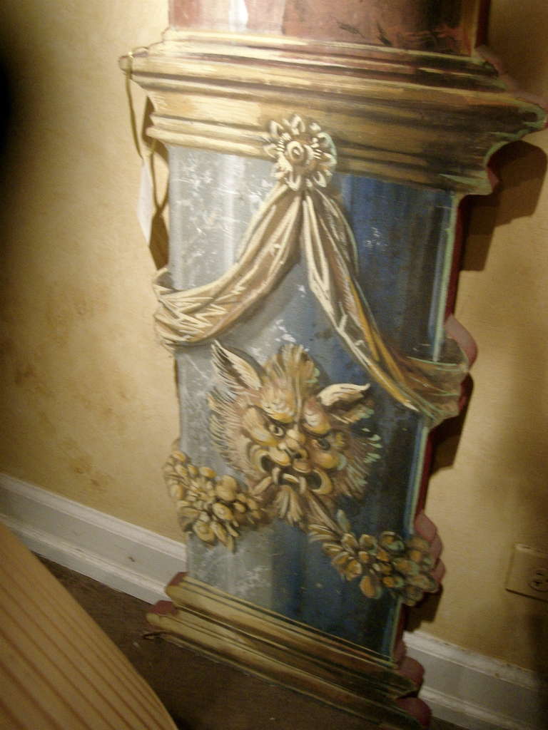 A pair of neoclassical Trompe L'oeil Columns, each painted to resemble marble.