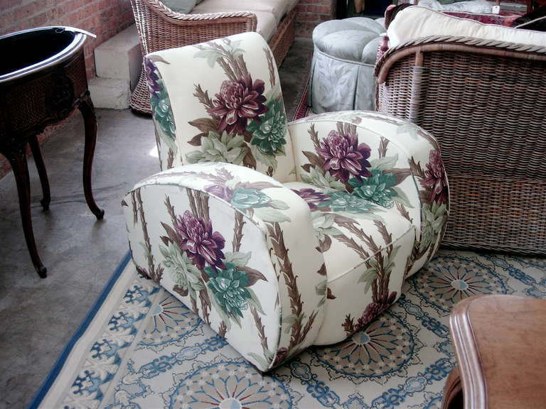 Dramatic Art Deco club chair reupholstered in floral barkcloth.