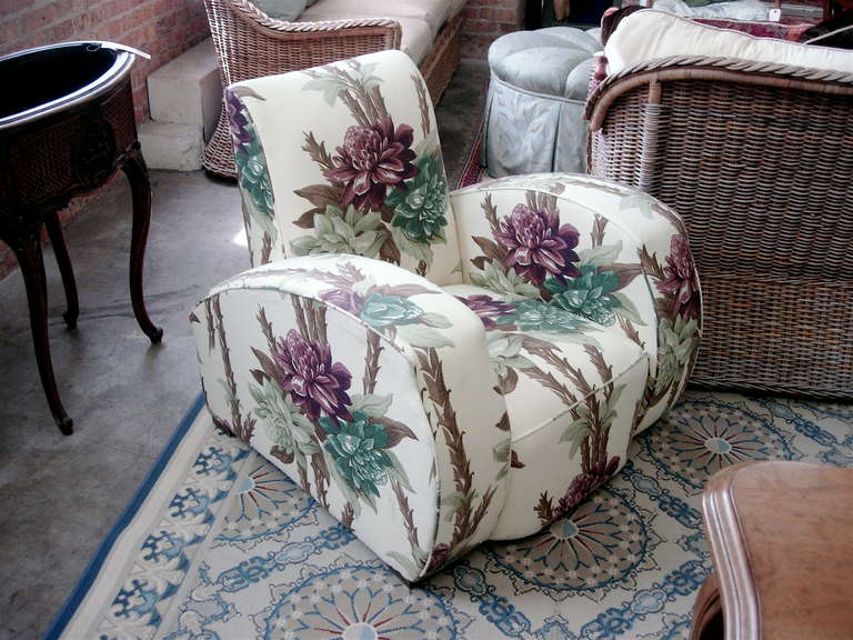 Dramatic Art Deco club chair reupholstered in floral barkcloth.