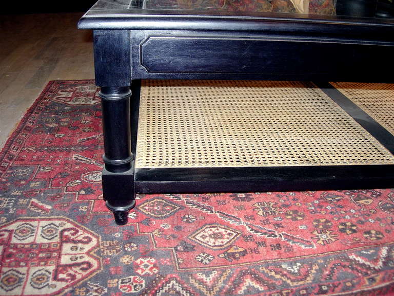 cane and glass coffee table