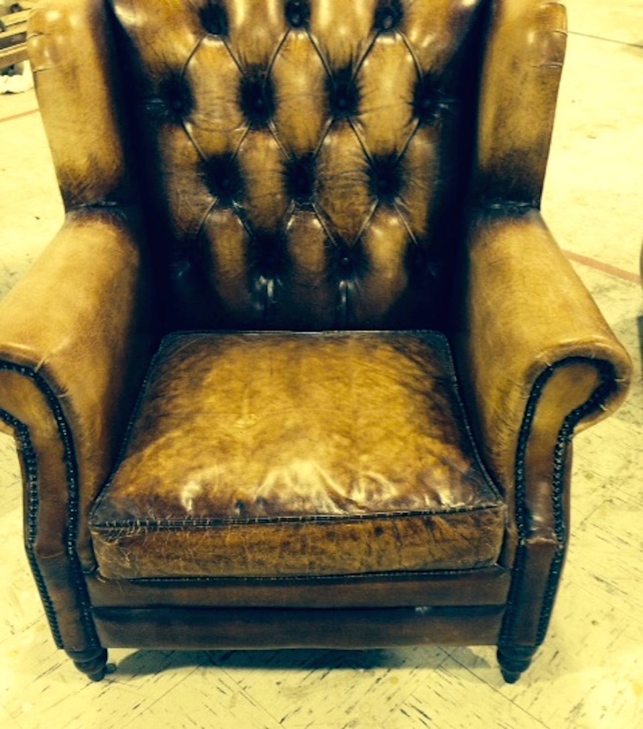 distressed brown leather chair