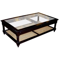 Anglo Indian Style Ebonized Wood, Glass And Cane Coffee Table