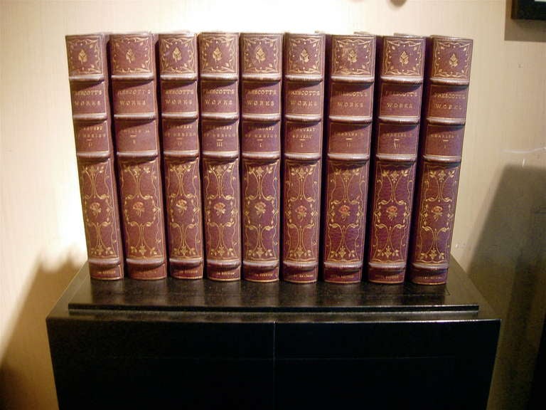 22 leather-bound books with gilt tooling