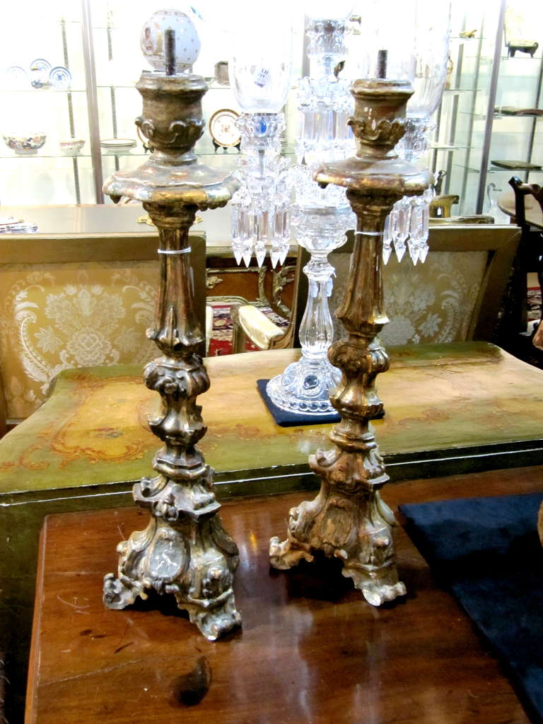 Pair of Continental Painted and Parcel Gilt Pricket Sticks