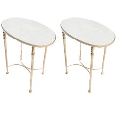 Deux tables à boissons en métal doré et marbre  Prix par table.