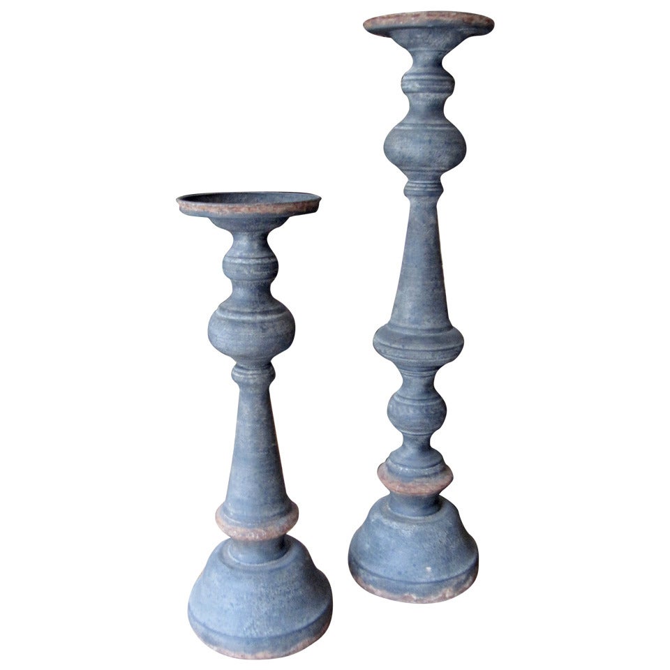 Two Patinated Metal Candle or Pricket Sticks