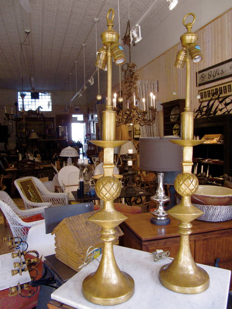 Handsome pair of gilt brass lamps in the manner of Alberto Giacometti.