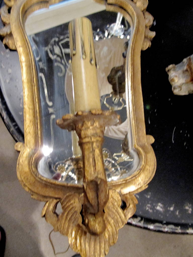 20th Century One Pair of Italian Giltwood Sconces with Mirror Backing