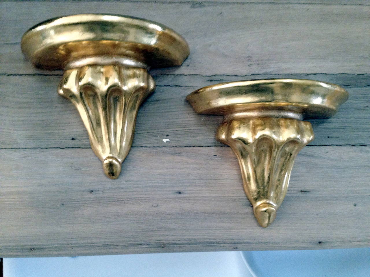 One pair of giltwood brackets with water gilding.  Beautifully finished.  We also have several other sets of various scale.  Feel free to call with questions.