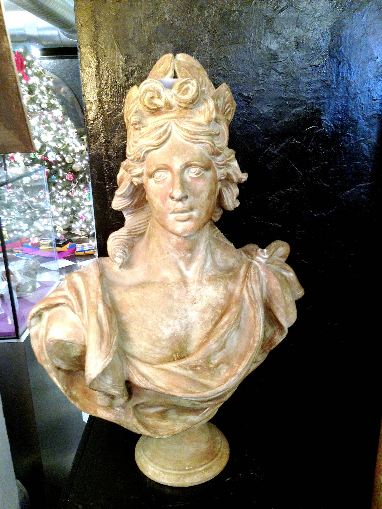 Stately Continental Terracotta Bust Depicting A Classical Female Bust.  
Depicting a classical female bust with laurel leaves around the head, the second being a woman. Very good-looking with lovely patina.  We also have other classical bust.  Feel