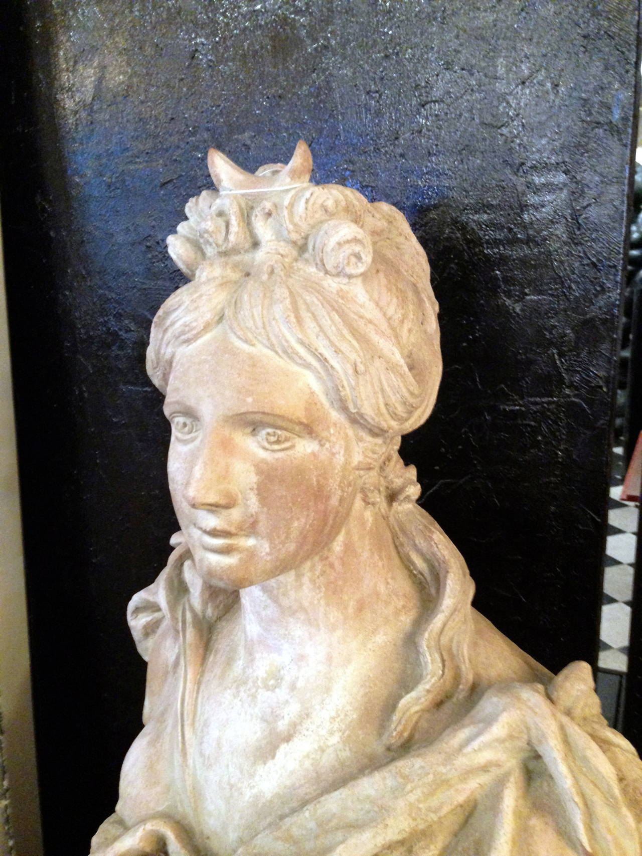 Stately Continental Terracotta Bust Depicting A Classical Female Bust.   In Excellent Condition For Sale In Buchanan, MI