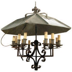 Charming Tole And Iron 12 Light Chandelier With Adjustable Zinc Shade