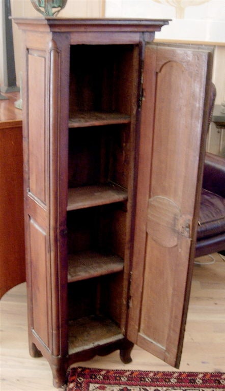 Charming diminutive French Provincial walnut cabinet.