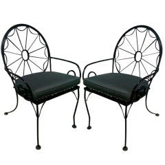 EXCEPTIONAL SET OF EIGHT IRON WHEEL BACK PATIO CHAIRS