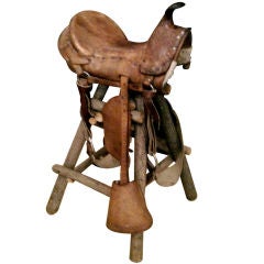 Antiques Child's Saddle Mounted on Later Rustic Stand