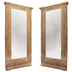 One Pair Of Monumental Pine Framed Mirrors With Worn Painted Fin