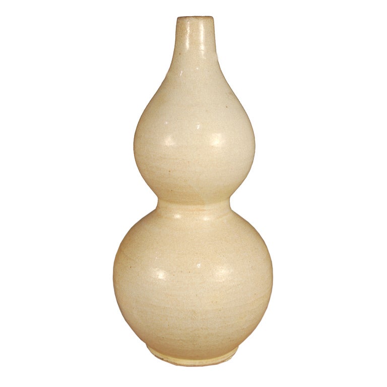 A Chinese cream colored crackle-glazed double-glazed vase.

Pagoda Red Collection#:  BJA095

