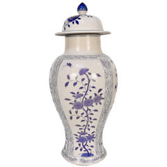 Vintage Pair of Chinese Blue and White Floral Jars with Lids