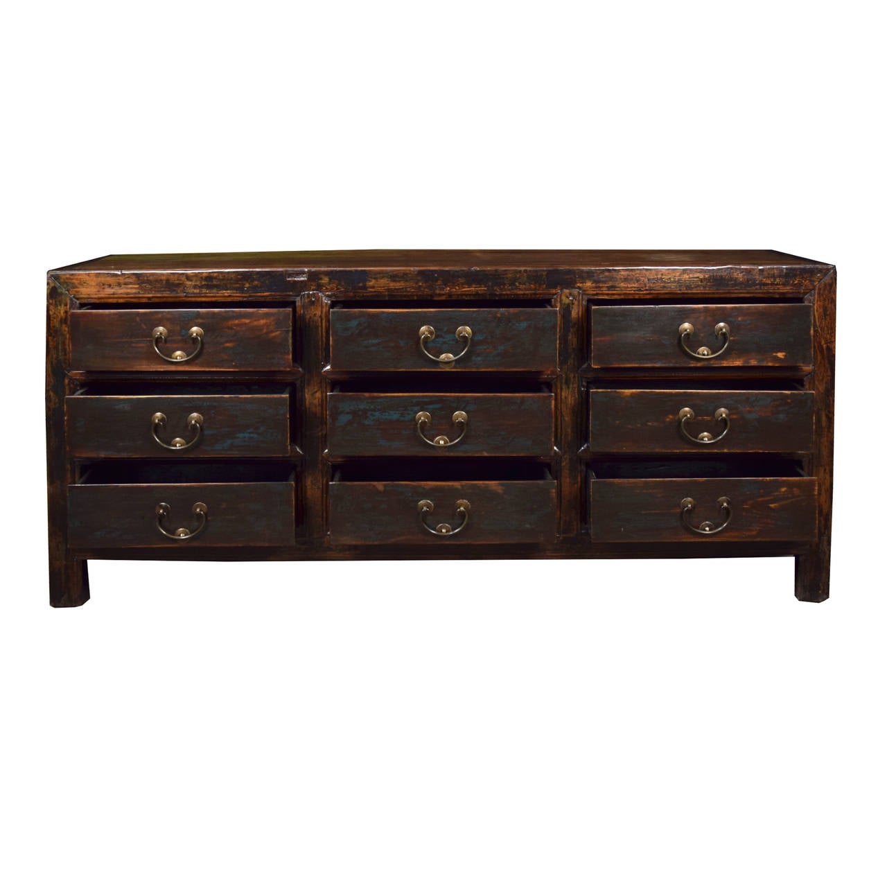 A chest from Shanxi province, China with nine drawers, circa 1850. This Chinese Northern elm piece retains a faint teal lacquer on the front.

