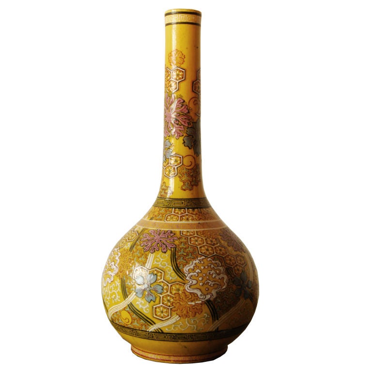 A pair of Japanese Meiji Period Satsuma bottle-neck vases with brilliant yellow glaze and geometric and floral motifs.

Pagoda Red Collection #:  BTE002


Keywords:  Vase, urn, vessel, planter, Japanese, Japan, pot, bowl, jar