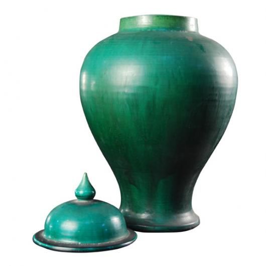 A pair of early 20th century green glazed baluster-form jars with lids, from Southern China.<br />
<br />
Pagoda Red Collection #:  Y049<br />
<br />
<br />
Keywords:  Jar, urn, vase, pot, bowl, basin, planter