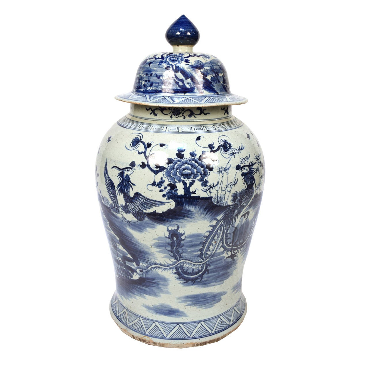 This elegant porcelain jar, in a shape called a ginger jar, was originally intended to hold spices. It is decorated with hand-painted peonies, the “king of flowers” symbolizing wealth; and a phoenix, the “king of birds,” a symbol of peace and